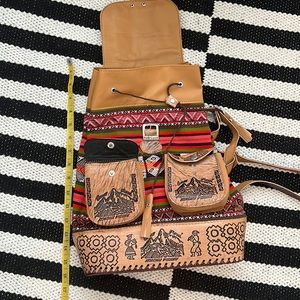 Bag Pack. Stylish cosmetic. Cute. Not for heavy stuff.